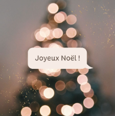 sapin de noël avec boules lumineuses et inscription Joyeux Noël